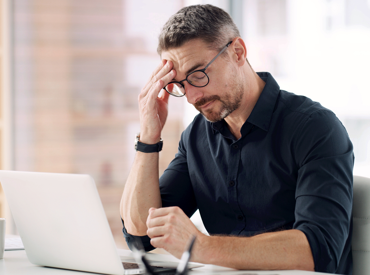 Centralized leasing operations image showing two people dscussing work